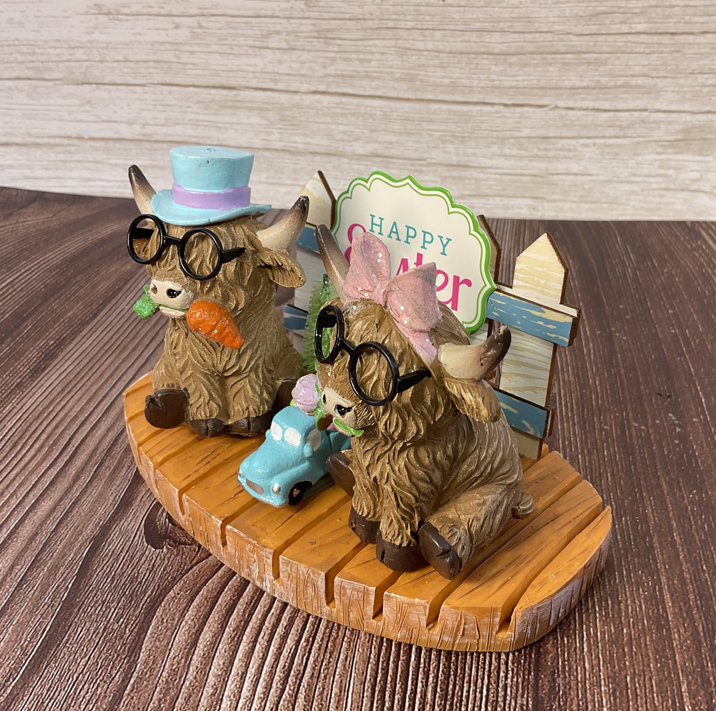 Easter Spring Highland Cow Resin Figurine Display on Faux Wood Base