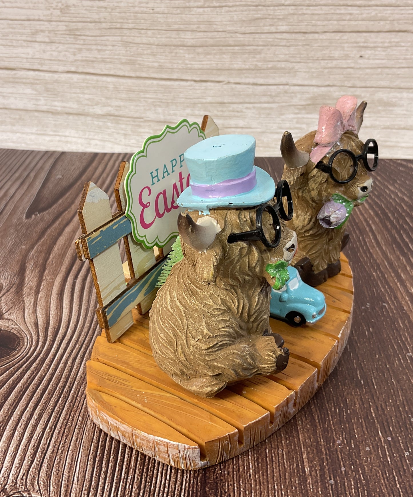 Easter Spring Highland Cow Resin Figurine Display on Faux Wood Base