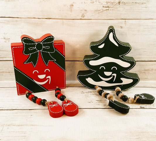 AGD Christmas Decor - AZ Delivery Smile Tree Present Dangling Legs Sitter 2pc