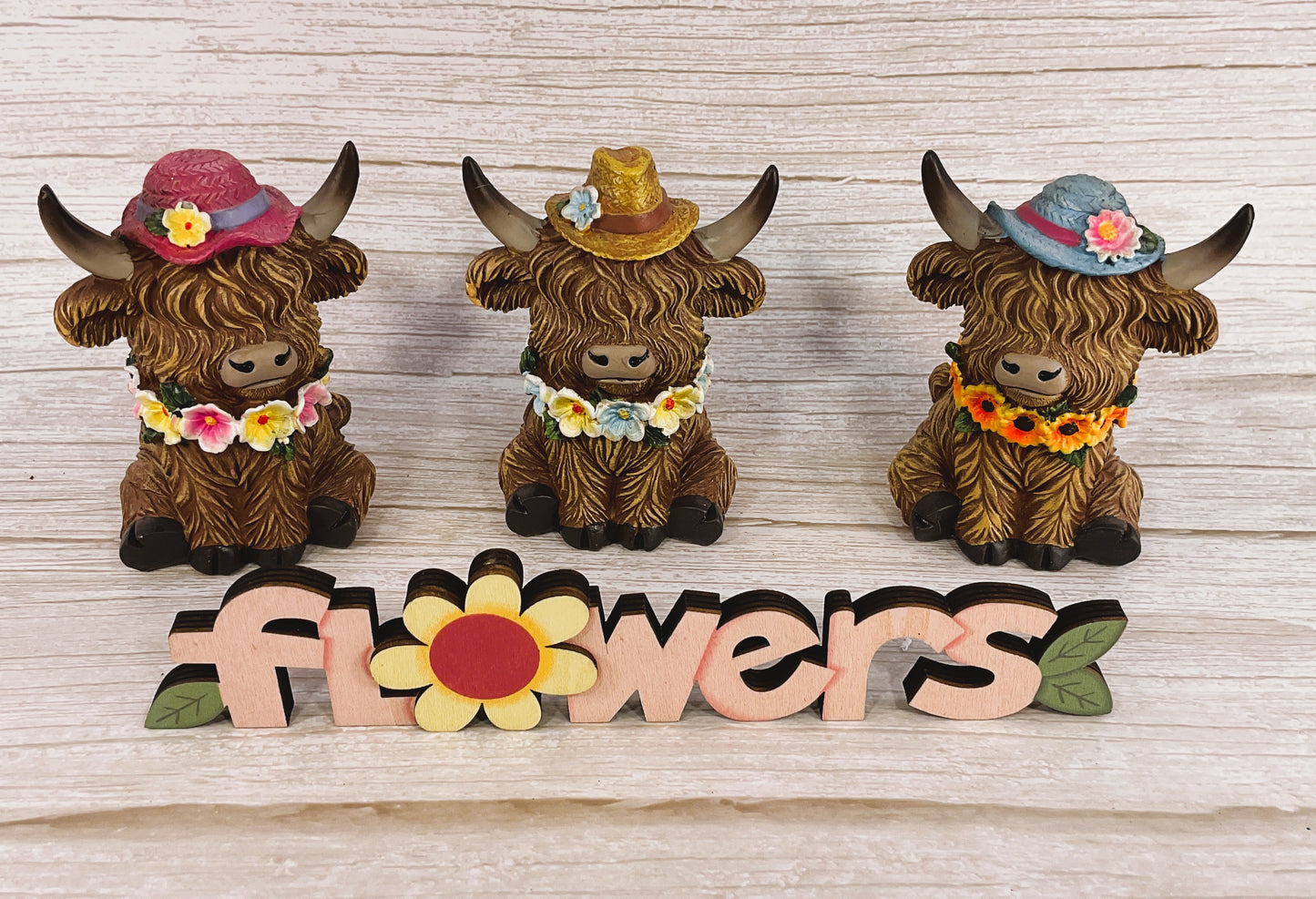 Gerson Spring Decor - Resin Highland Cow Flowers & Hats Figurine 4pc Set