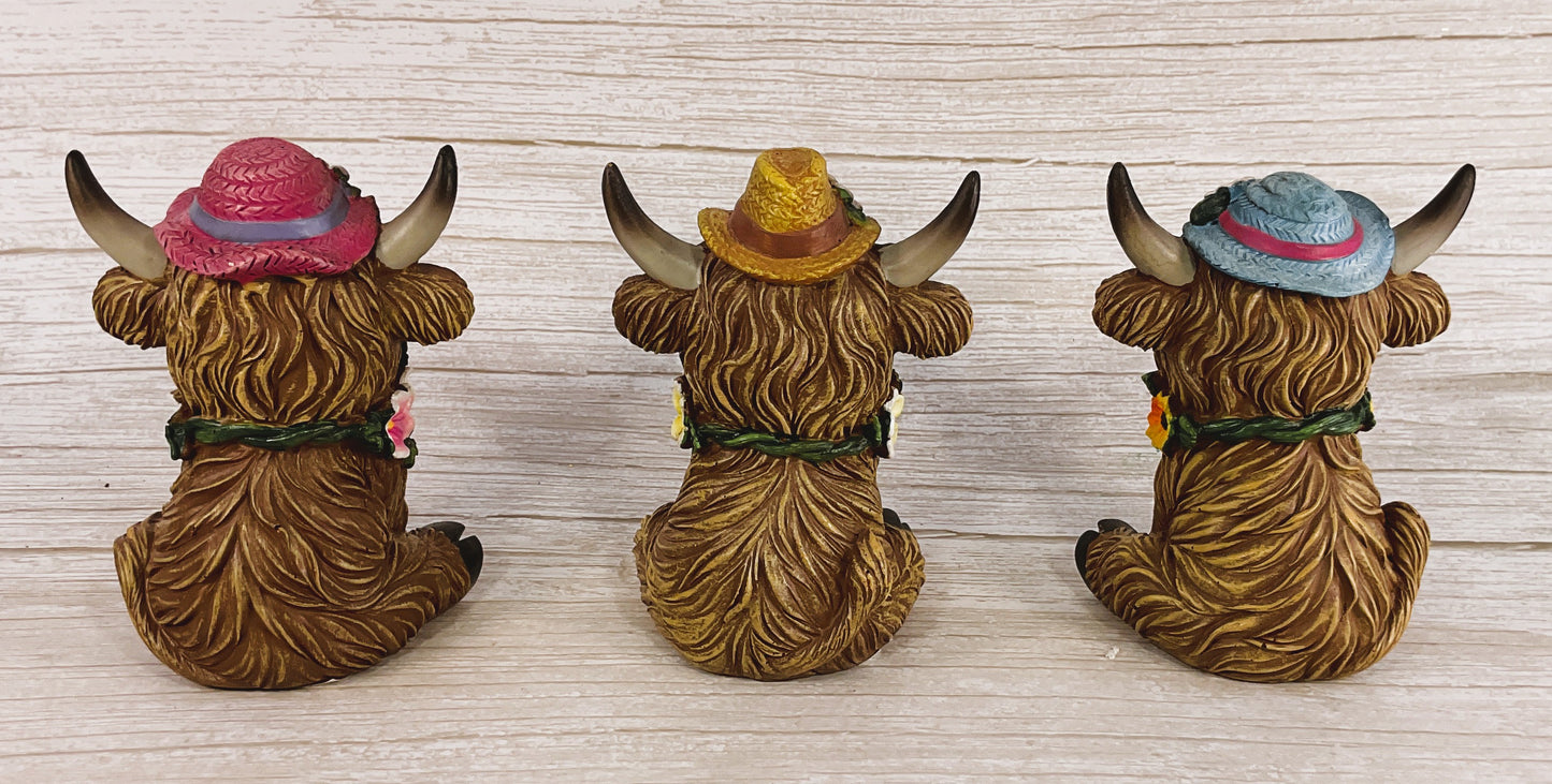 Gerson Spring Decor - Resin Highland Cow Flowers & Hats Figurine 4pc Set