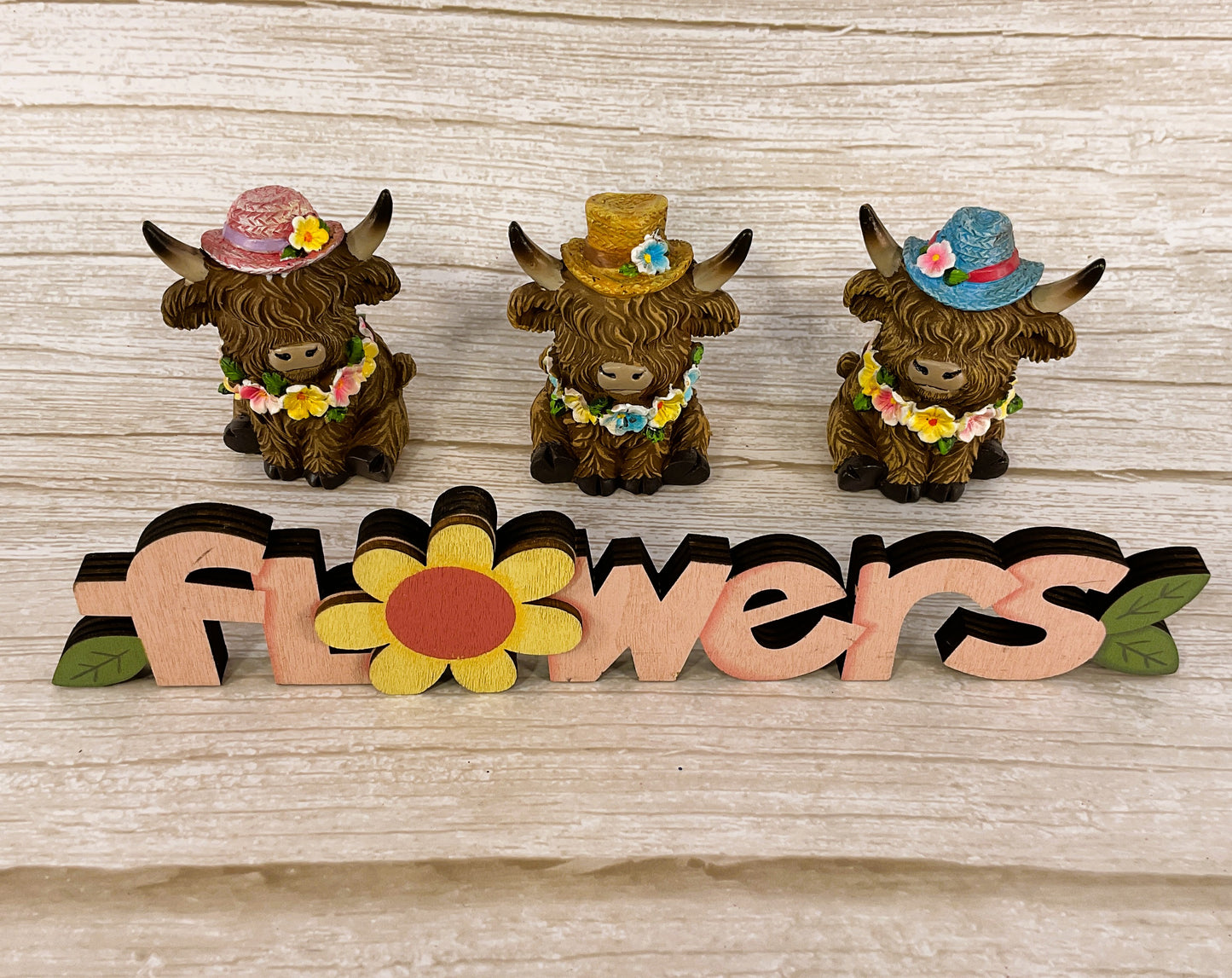 Gerson Spring Decor - Resin Highland Cow Flower Hats Figurines 4pc Set
